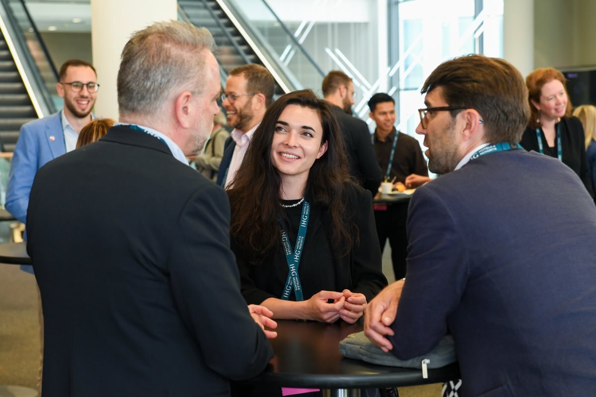 Attendees talking at IMEX Frankfurt 2025