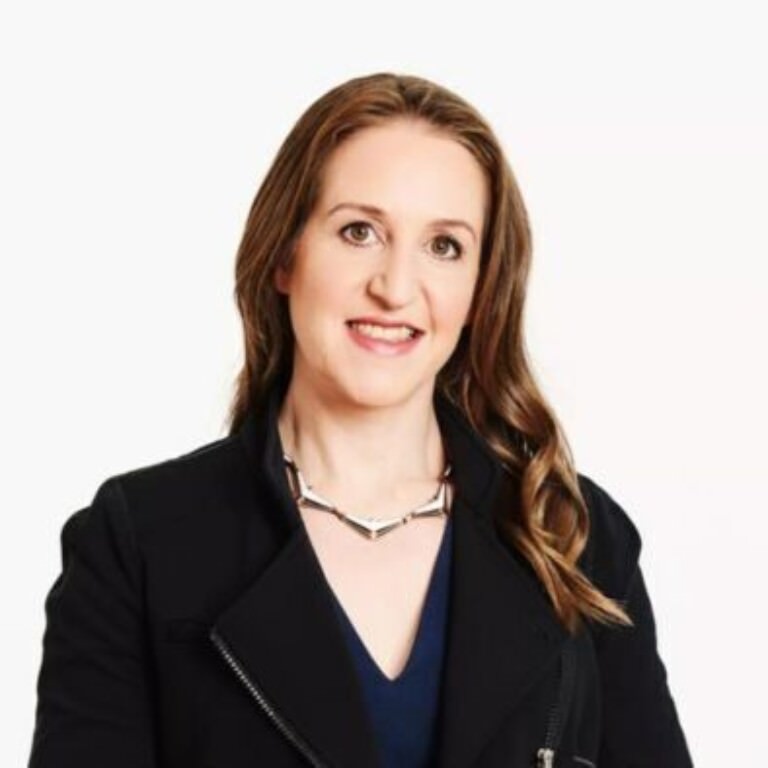Carina Bauer IMEX CEO black jacket headshot
